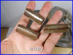 Antique vintage German metal chocolate mold with clamps sitting bear on tree trunk