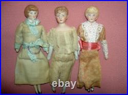 FOUR antique German bisque, 5 dollhouse FAMILY dolls originally dressed exlnt