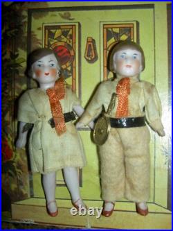 FOUR antique German bisque, 5 dollhouse FAMILY dolls originally dressed exlnt