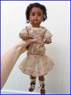 Lovely antique black doll brown bisque original old dress