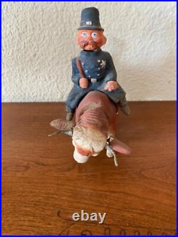 RARE. Vintage/ antique Candy container nodder Bobby riding a bull German