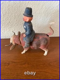 RARE. Vintage/ antique Candy container nodder Bobby riding a bull German