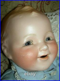 UNUSUAL and RARE, antique German bisque, character baby doll with molded hair