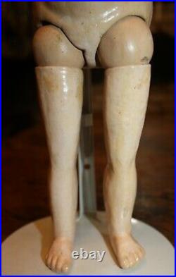 Very Early Unmarked German Doll straight arms & legs. Wonderful rayed eyes CM