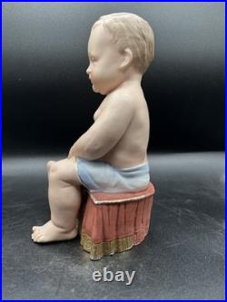 Vintage Hertwig German Porcelain Bisque-A Boy Sitting On A Fancy Pillow 8 1/2