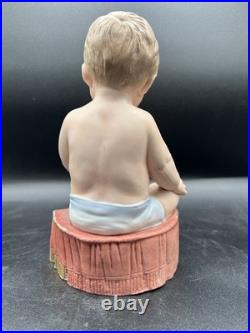Vintage Hertwig German Porcelain Bisque-A Boy Sitting On A Fancy Pillow 8 1/2