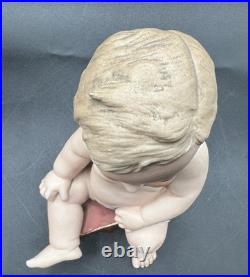 Vintage Hertwig German Porcelain Bisque-A Boy Sitting On A Fancy Pillow 8 1/2