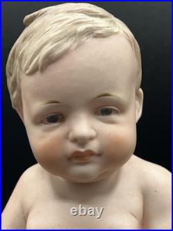 Vintage Hertwig German Porcelain Bisque-A Boy Sitting On A Fancy Pillow 8 1/2