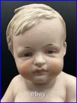 Vintage Hertwig German Porcelain Bisque-A Boy Sitting On A Fancy Pillow 8 1/2