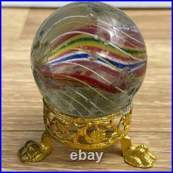 Vintage Large Antique German Swirl Glass Shooter Marble with Gold Paw Stand