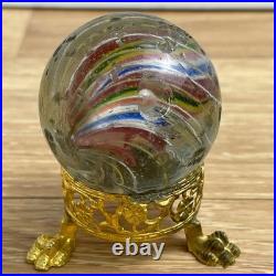 Vintage Large Antique German Swirl Glass Shooter Marble with Gold Paw Stand