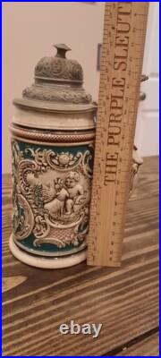Vintage/antique 8inch German Beer Stein With Pewter Lid Green Cream Child Dog