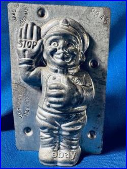 Vintage antique German chocolate mold Policeman Stop traffic Van Emden Co, N. Y