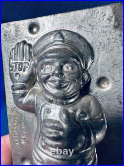 Vintage antique German chocolate mold Policeman Stop traffic Van Emden Co, N. Y